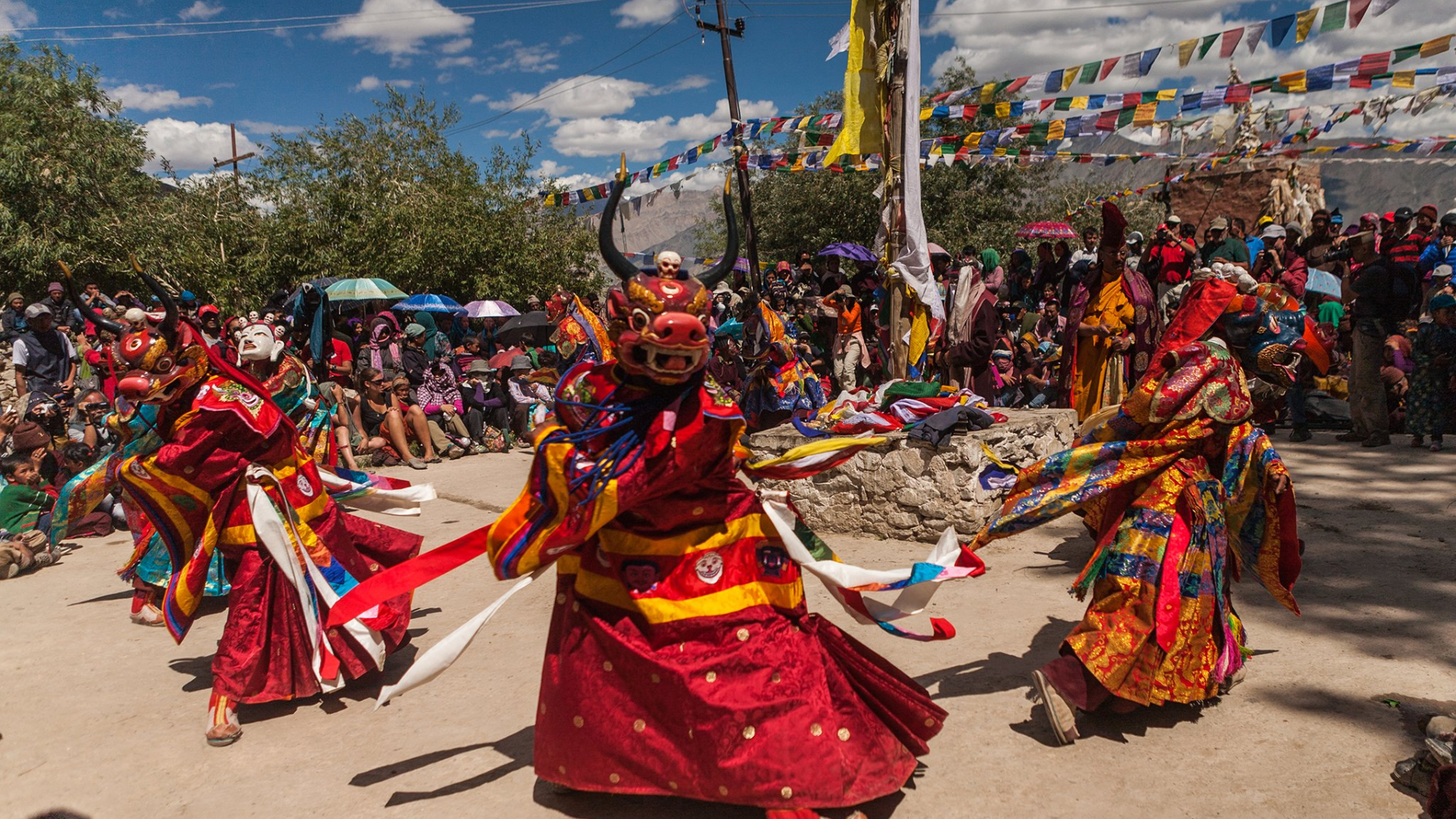Monastic festival in Ladakh with monks performing rituals